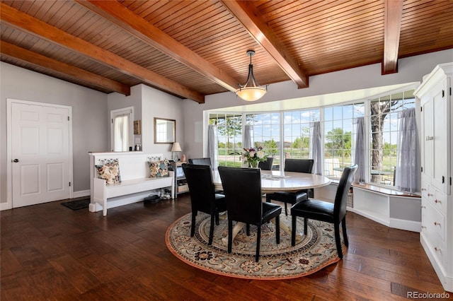 10220 W Montgomery Ave, Littleton, CO 80127 - dining space with healthy amount of natural light, hardwood / wood-style floors, wood ceiling, and baseboards