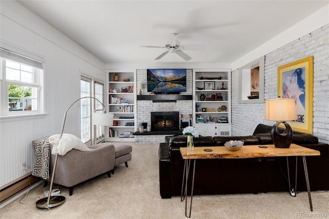 10220 W Montgomery Ave, Littleton, CO 80127 - carpeted home office featuring a ceiling fan, built in features, and a fireplace