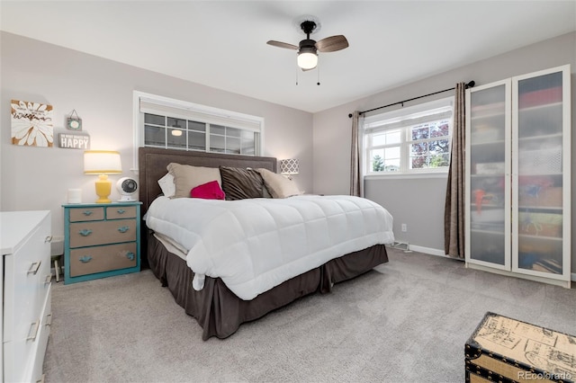 10220 W Montgomery Ave, Littleton, CO 80127 - bedroom with light colored carpet and ceiling fan
