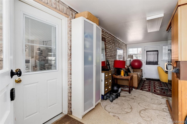 10220 W Montgomery Ave, Littleton, CO 80127 - interior space with brick wall