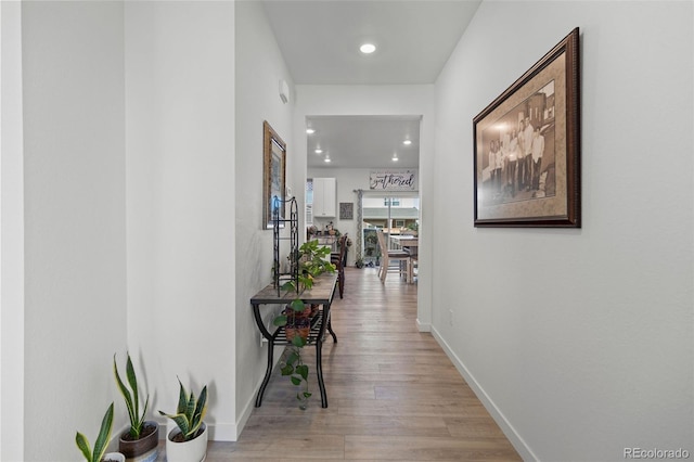 hallway featuring light wood-type flooring