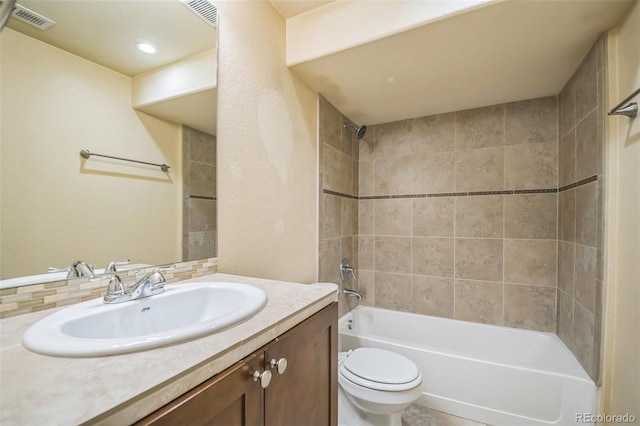 2539 N York St, Denver, CO 80205 - bathroom featuring toilet, bathing tub / shower combination, and vanity