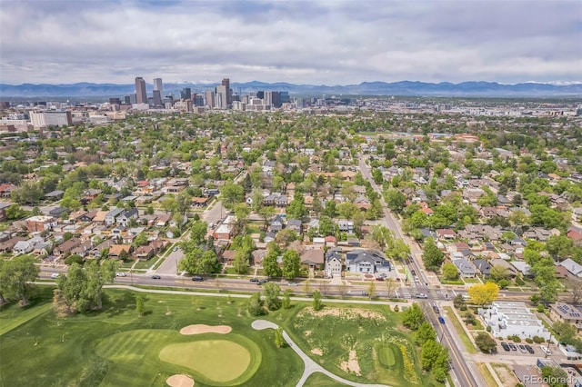 2539 N York St, Denver, CO 80205 - aerial view of property's location featuring a mountainous background and nearby suburban area