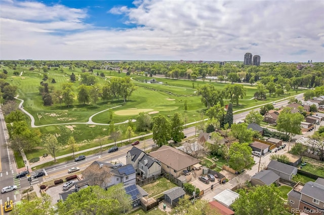 2539 N York St, Denver, CO 80205 - aerial overview of property's location with a golf club, nearby suburban area, and a tree filled landscape