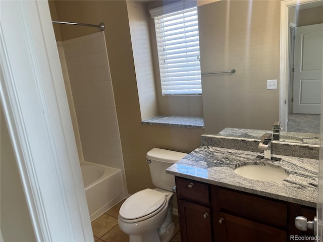 full bath with shower / bathtub combination, toilet, vanity, and tile patterned flooring