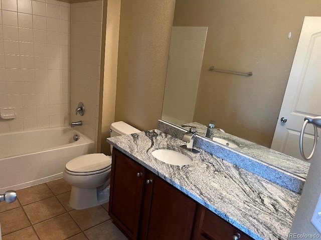 bathroom with shower / bathtub combination, toilet, vanity, and tile patterned flooring