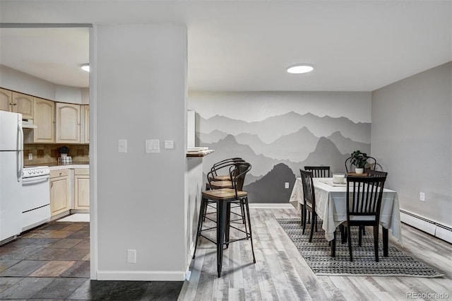 891 Fairview Blvd Unit 20, Breckenridge, CO 80424 - dining space featuring baseboards and baseboard heating