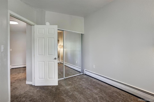 891 Fairview Blvd Unit 20, Breckenridge, CO 80424 - unfurnished bedroom with a baseboard radiator, carpet floors, and a closet