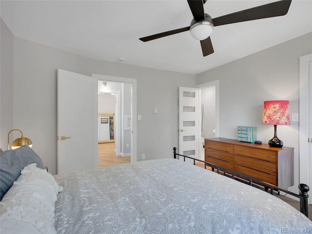 6574 Olympus Dr, Evergreen, CO 80439 - bedroom with ceiling fan and wood finished floors