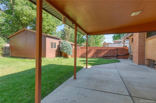 3230 Balsam St, Wheat Ridge, CO 80033 - view of patio / terrace featuring an outdoor structure and a gate