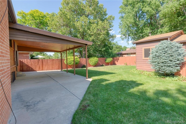 3230 Balsam St, Wheat Ridge, CO 80033 - fenced backyard with a patio area