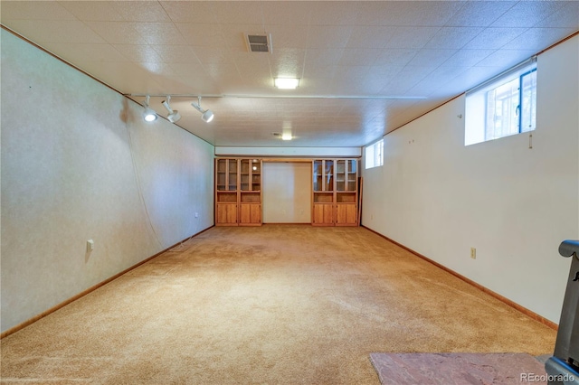 3230 Balsam St, Wheat Ridge, CO 80033 - basement with light carpet and rail lighting