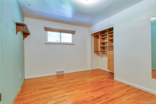 3230 Balsam St, Wheat Ridge, CO 80033 - unfurnished bedroom featuring light wood-type flooring and a closet