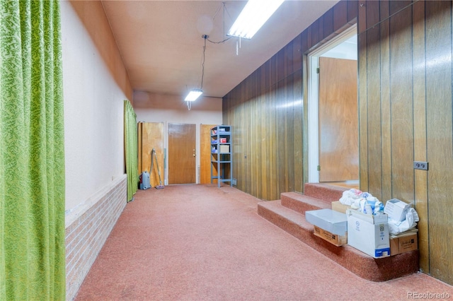 3230 Balsam St, Wheat Ridge, CO 80033 - basement featuring carpet floors and wood walls