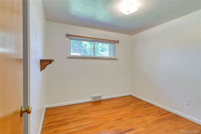 3230 Balsam St, Wheat Ridge, CO 80033 - unfurnished room with light wood-type flooring and baseboards