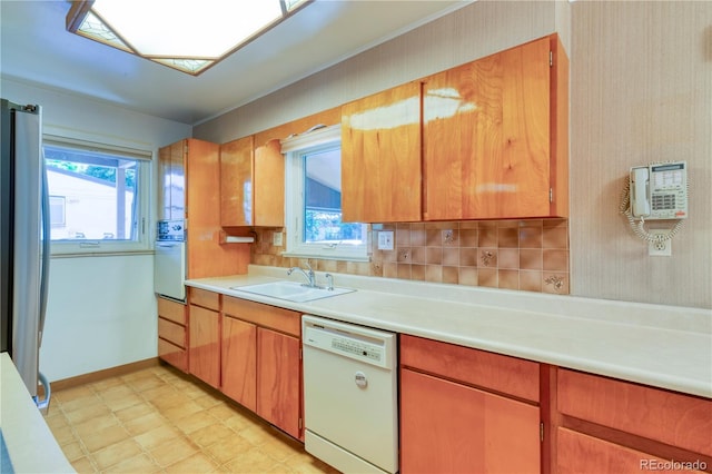 3230 Balsam St, Wheat Ridge, CO 80033 - kitchen with white appliances, plenty of natural light, and light countertops
