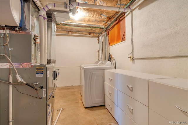 3230 Balsam St, Wheat Ridge, CO 80033 - washroom featuring washer and clothes dryer and heating unit