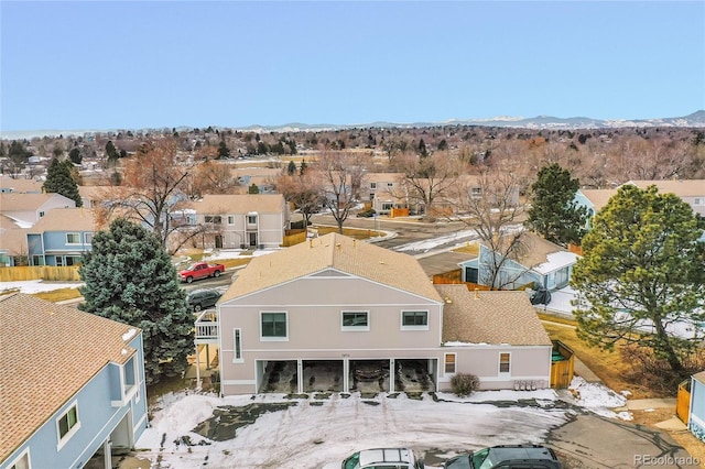 aerial perspective of suburban area featuring a mountainous background