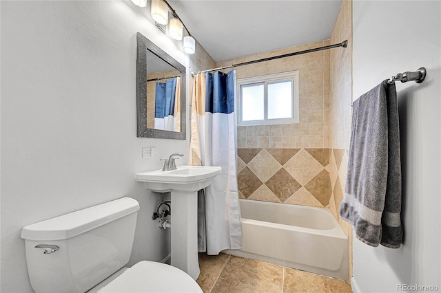 bathroom featuring shower / bath combination with curtain, toilet, and tile patterned flooring