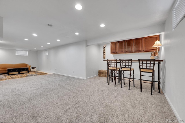 interior space featuring light colored carpet