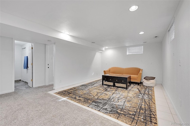 sitting room featuring carpet flooring