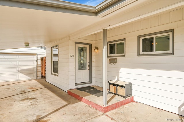 property entrance featuring a garage