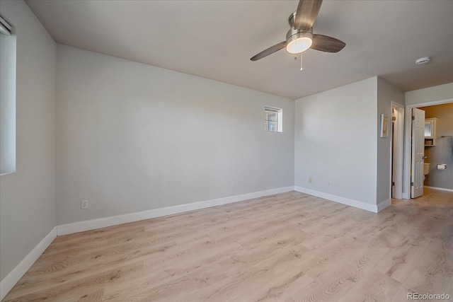 unfurnished room with light wood-type flooring and ceiling fan