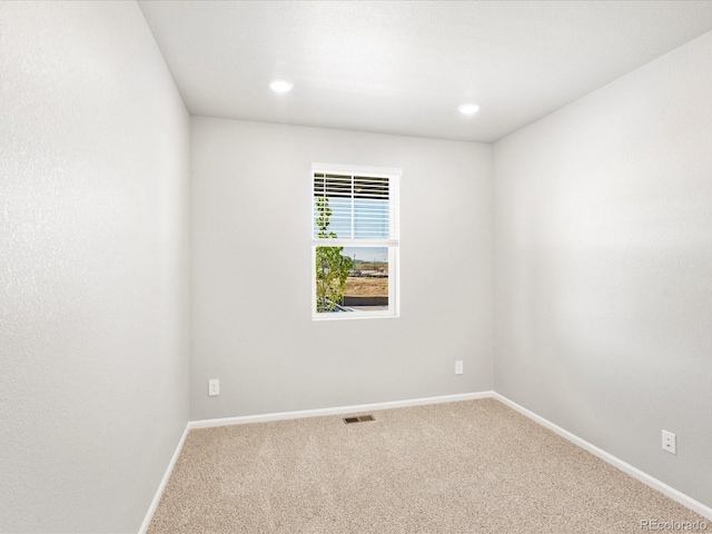 17487 E 89th Way, Commerce City, CO 80022 - carpeted spare room with baseboards and recessed lighting