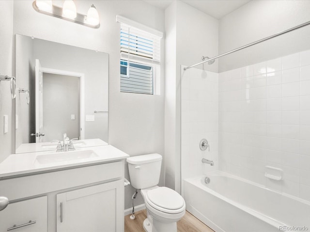 17487 E 89th Way, Commerce City, CO 80022 - bathroom featuring toilet, wood finished floors, vanity, shower / tub combination, and baseboards