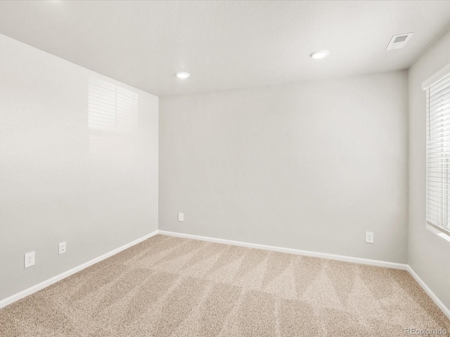 17487 E 89th Way, Commerce City, CO 80022 - carpeted empty room with baseboards and recessed lighting