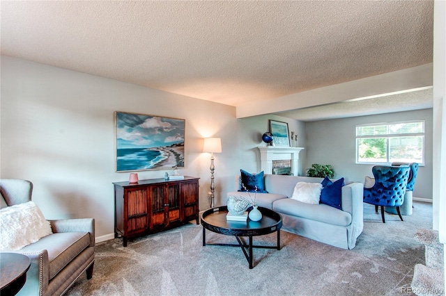 8538 W Glasgow Pl, Littleton, CO 80128 - living room featuring carpet floors, a textured ceiling, and a fireplace