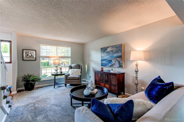 8538 W Glasgow Pl, Littleton, CO 80128 - carpeted living area with a textured ceiling
