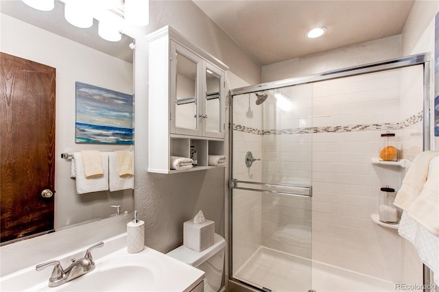 8538 W Glasgow Pl, Littleton, CO 80128 - bathroom with a shower stall and vanity