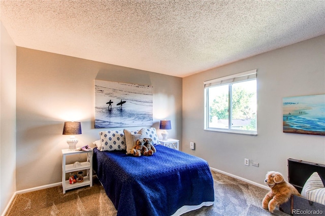 8538 W Glasgow Pl, Littleton, CO 80128 - bedroom featuring carpet flooring and a textured ceiling