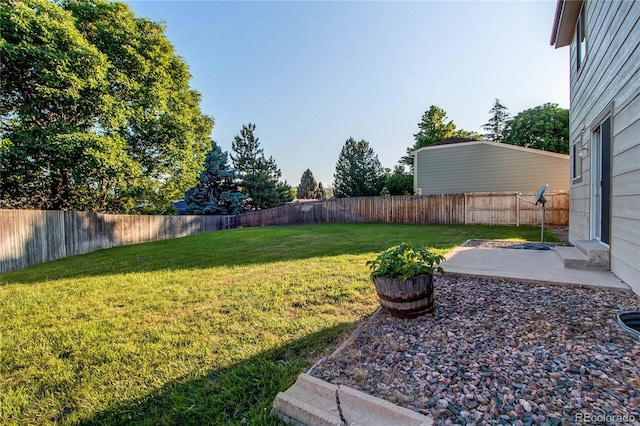 8538 W Glasgow Pl, Littleton, CO 80128 - fenced backyard featuring a patio