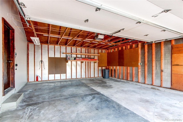 8538 W Glasgow Pl, Littleton, CO 80128 - garage featuring a garage door opener
