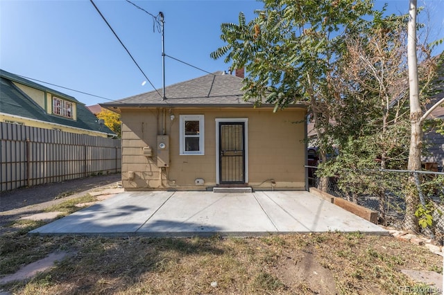 rear view of house featuring a patio