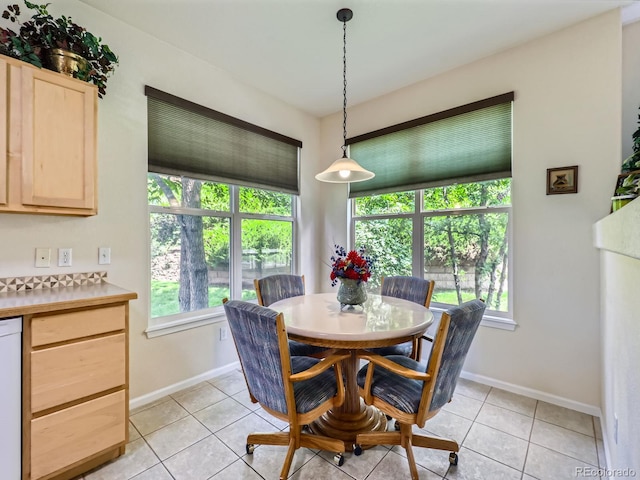 6626 S Reed Way Unit A, Littleton, CO 80123 - dining area with plenty of natural light and light tile patterned flooring