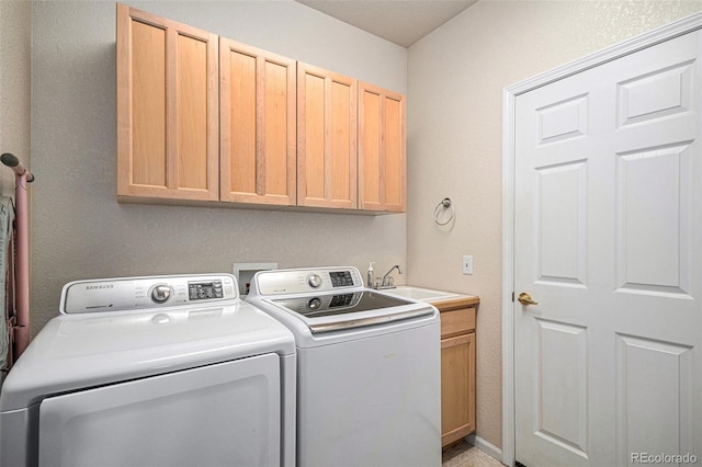 6626 S Reed Way Unit A, Littleton, CO 80123 - laundry area featuring separate washer and dryer and cabinet space
