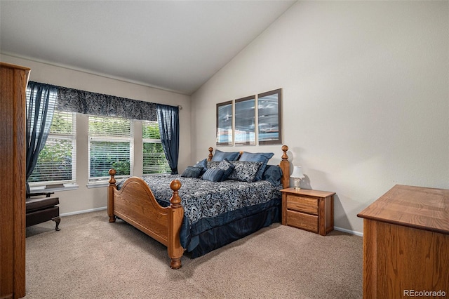 6626 S Reed Way Unit A, Littleton, CO 80123 - bedroom featuring light carpet and high vaulted ceiling