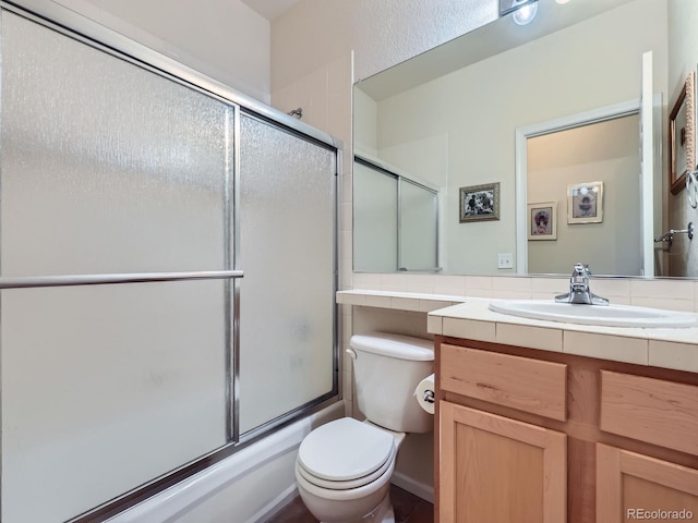 6626 S Reed Way Unit A, Littleton, CO 80123 - full bathroom with vanity and shower / bath combination with glass door