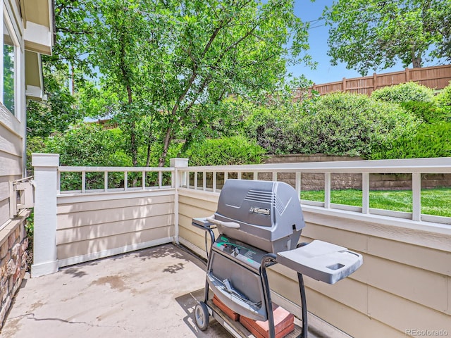 6626 S Reed Way Unit A, Littleton, CO 80123 - view of patio / terrace featuring a grill