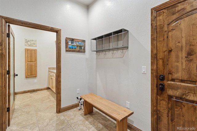 interior space with light tile patterned floors