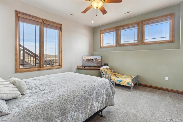 bedroom featuring ceiling fan and carpet floors