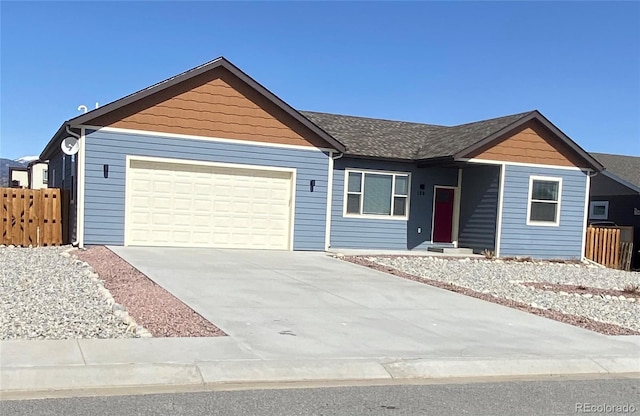 129 Red Tail Blvd, Buena Vista, CO 81211 - ranch-style house featuring a garage, fence, and driveway
