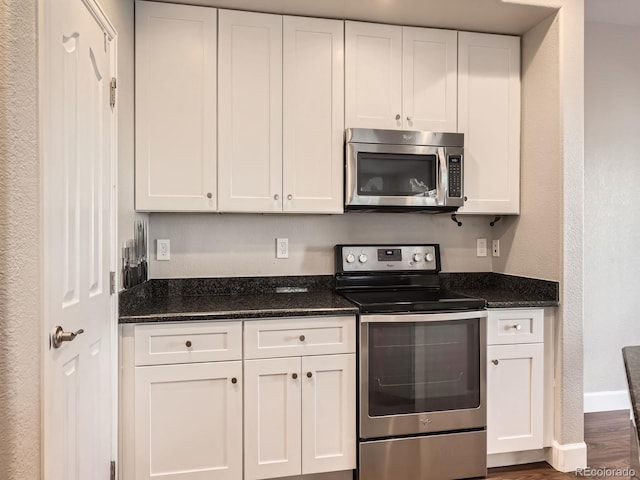 kitchen with white cabinetry and stainless steel appliances