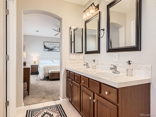 bathroom featuring vanity, tile patterned floors, and ceiling fan