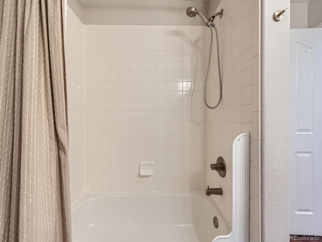 bathroom featuring shower / bathtub combination with curtain