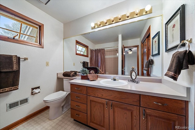 full bathroom with tile patterned floors, baseboards, toilet, vanity, and a shower with shower curtain