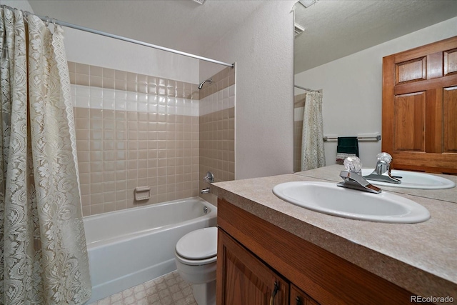 full bath with shower / bath combination with curtain, toilet, vanity, and tile patterned floors